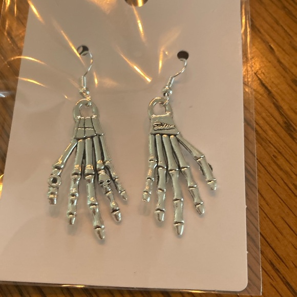 Jewelry - “ sterling silver Skeleton Hands” earrings.